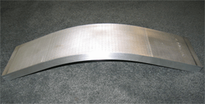 A 0.4 inch (10mm) thick piece of 7050 Aluminum formed by laser peening.